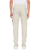 STONE ISLAND - Jogginghose mit aufgesetzten Taschen in beige
